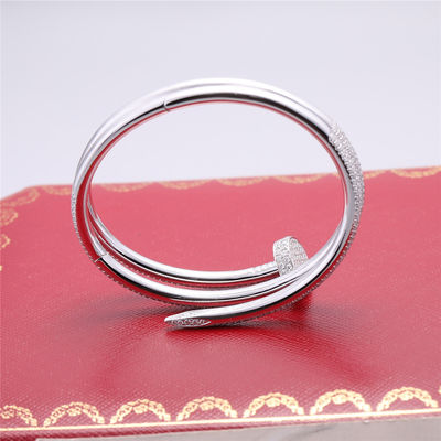Качество Браслет ООН Clou Juste ювелирных изделий в белом золоте 18k с полностью вымощенными диамантами фабрика